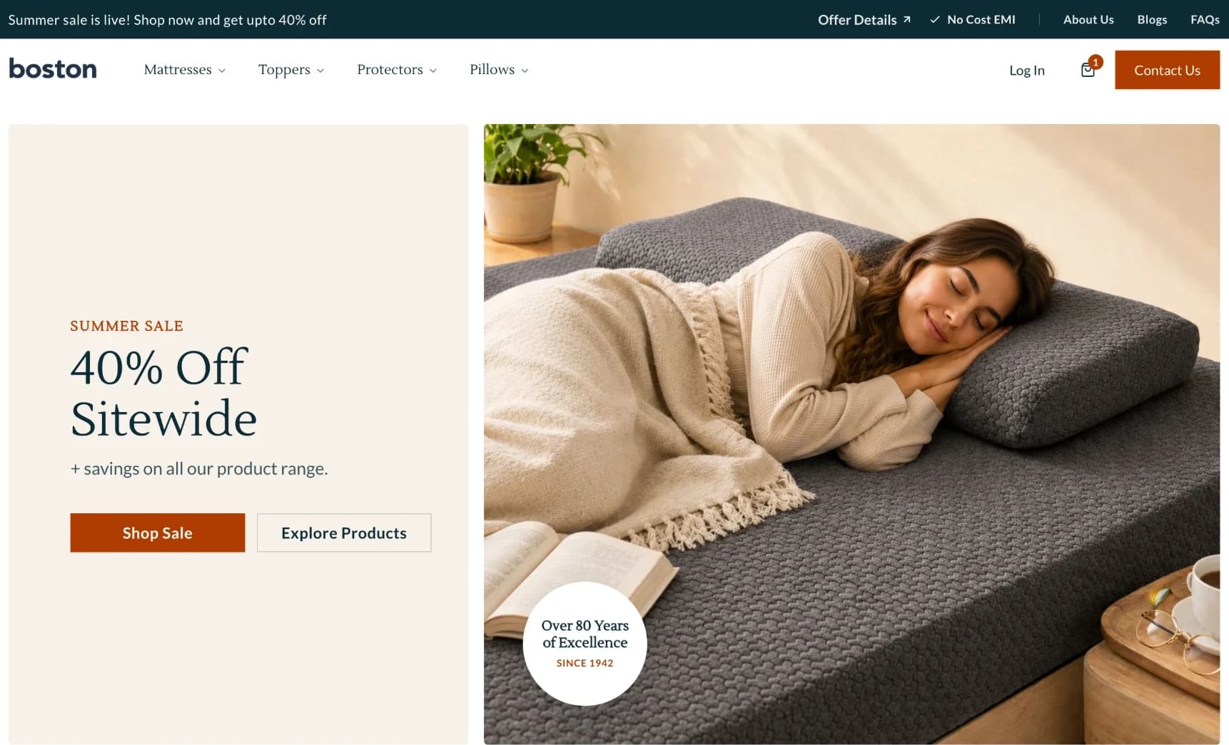 The Boston mattress website homepage, with a 40% off summer sale beside a woman asleep on a charcoal mattress